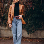 Young woman walking in park
